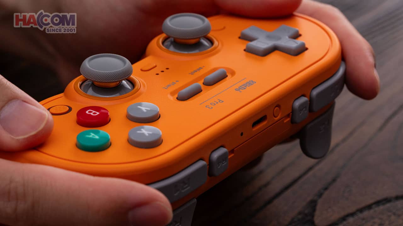 tay cam choi game hacom 3