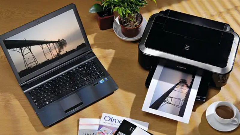 Khởi động lại máy tính và máy in